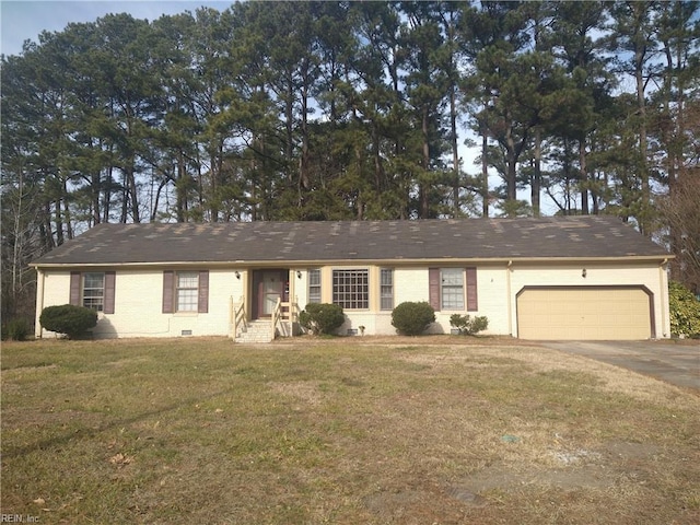 ranch-style house with a garage and a front yard