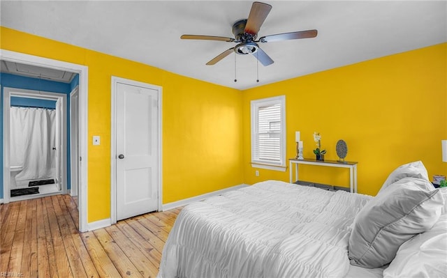 bedroom with ceiling fan and light hardwood / wood-style floors