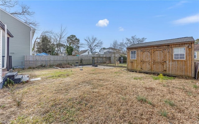 view of yard with a storage shed