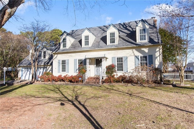 cape cod home with a front lawn