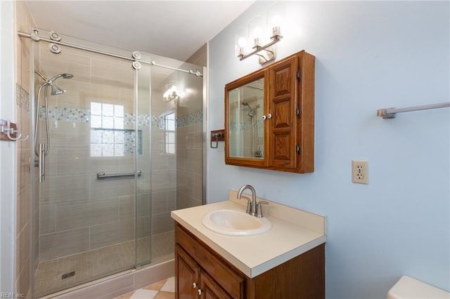 bathroom with vanity and an enclosed shower