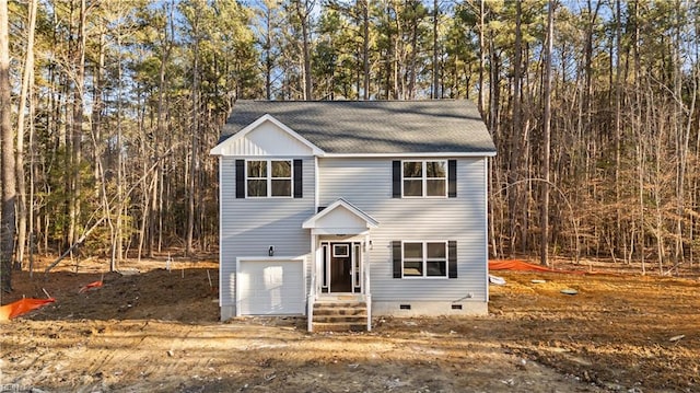 view of front of property featuring a garage