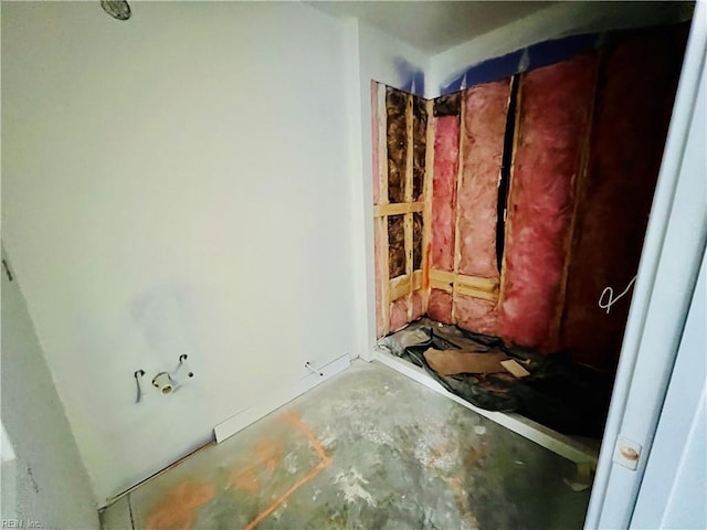 bathroom featuring concrete flooring