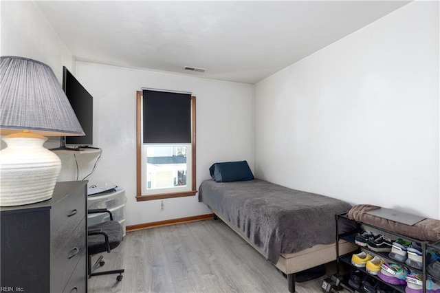 bedroom featuring light hardwood / wood-style flooring