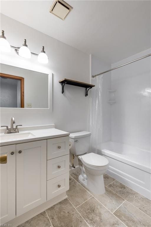 full bathroom featuring vanity, toilet, and tub / shower combination