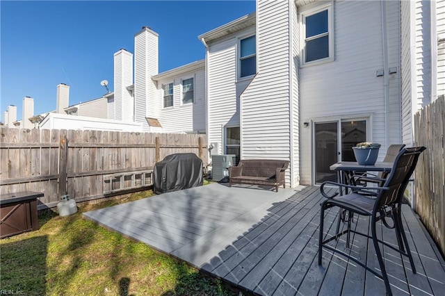 wooden terrace featuring area for grilling