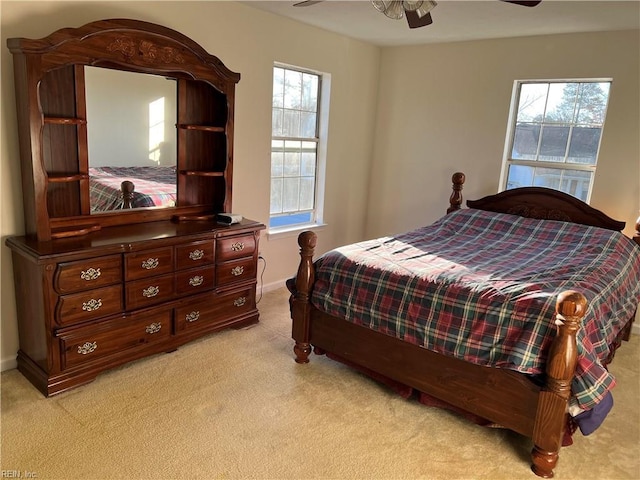 bedroom with light carpet