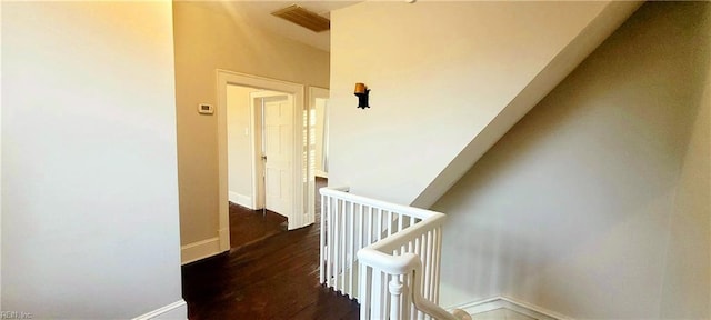 corridor featuring dark hardwood / wood-style flooring