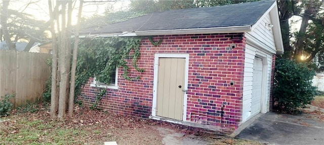 view of outbuilding featuring a garage