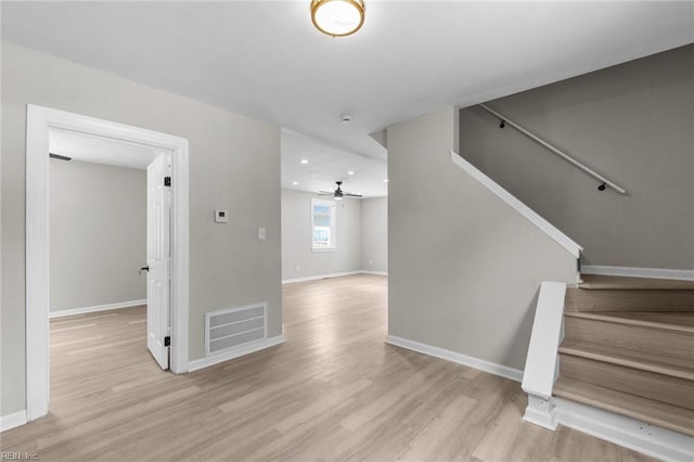 interior space featuring ceiling fan and light wood-type flooring