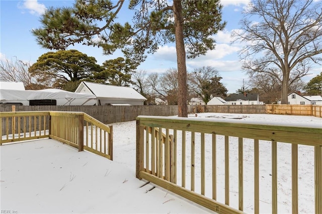 view of snow covered deck