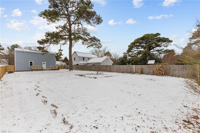 view of yard covered in snow