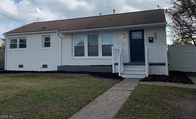 view of front facade with a front lawn