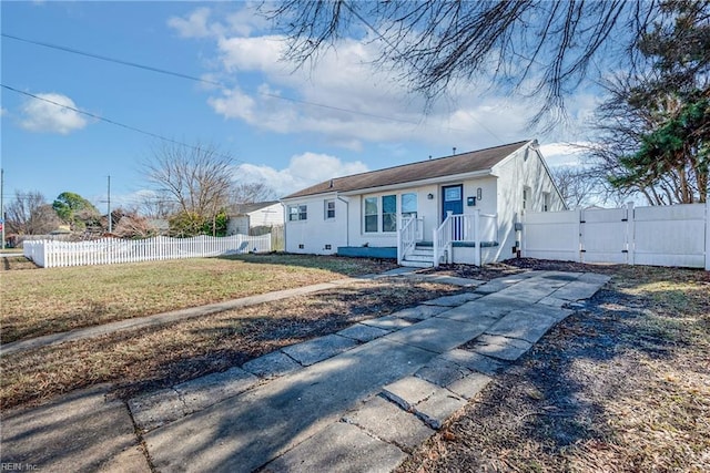 view of front of home with a front yard