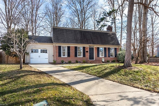 view of front facade featuring a garage and a front yard