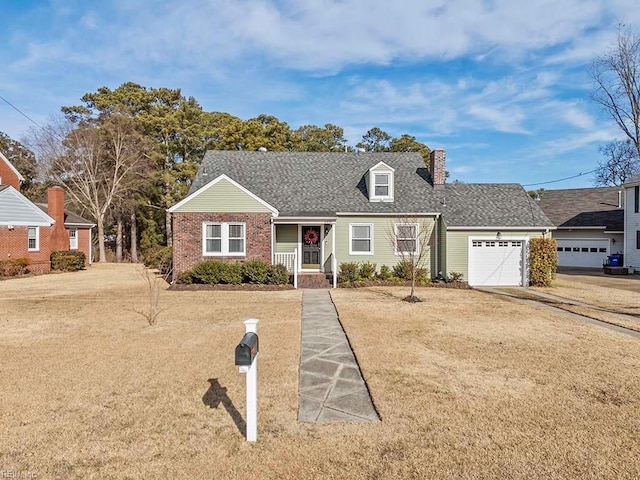 cape cod house with a porch, a garage, and a front yard