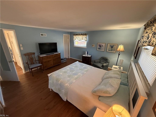 bedroom featuring hardwood / wood-style flooring