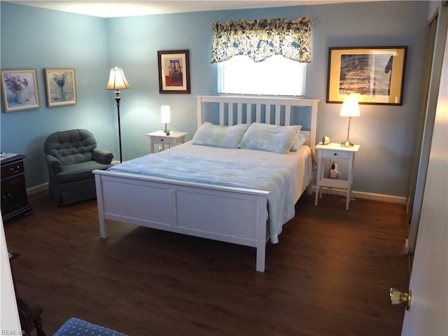 bedroom featuring dark wood-type flooring