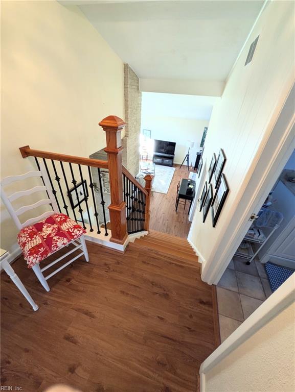 stairway with wood-type flooring