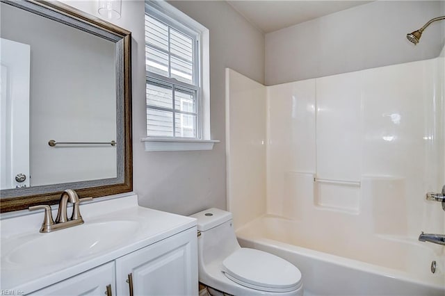 full bathroom with vanity, toilet, and tub / shower combination