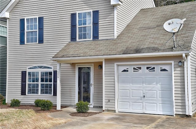 view of front of property featuring a garage