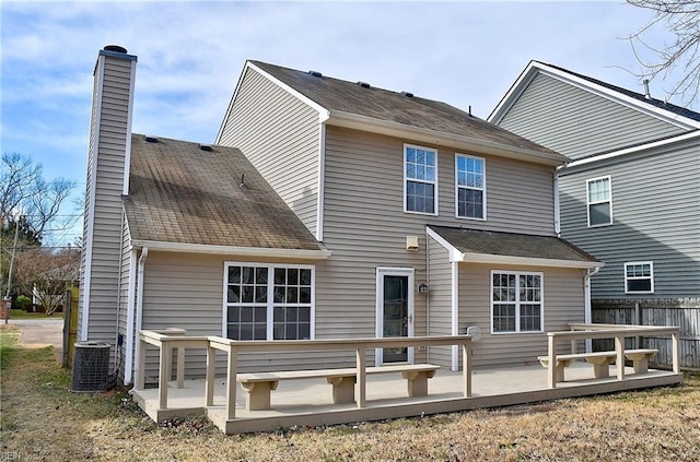 back of property featuring a wooden deck and central air condition unit