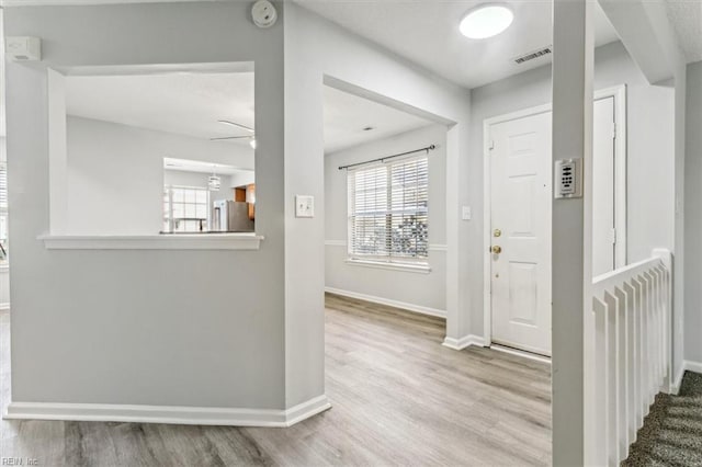 entrance foyer featuring light hardwood / wood-style floors