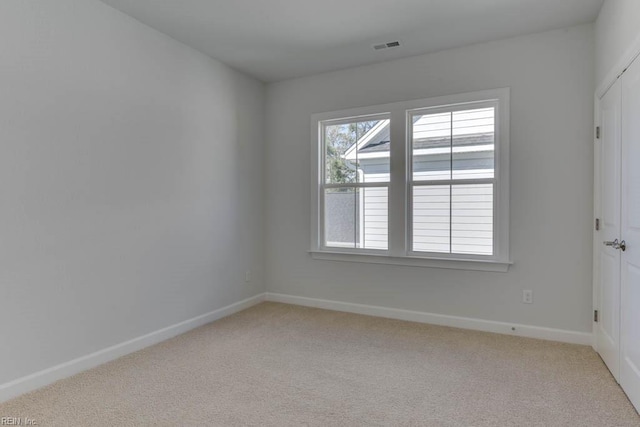 empty room with light carpet