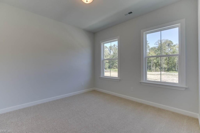 view of carpeted spare room