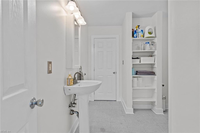 bathroom with tile patterned flooring