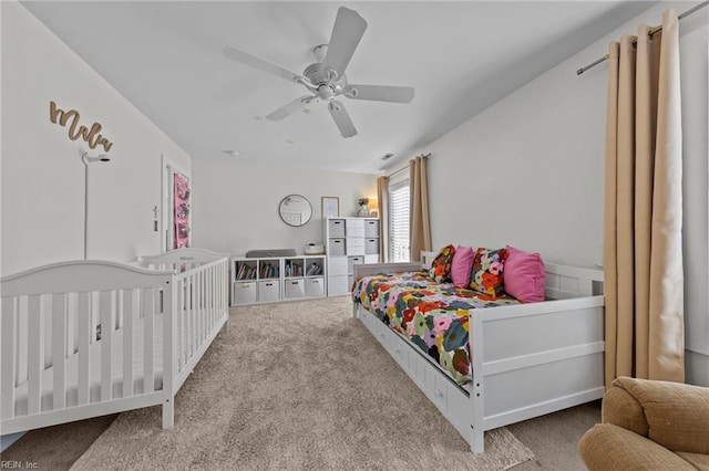 bedroom featuring ceiling fan and carpet flooring