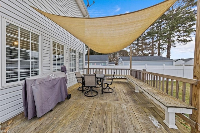 wooden deck with area for grilling