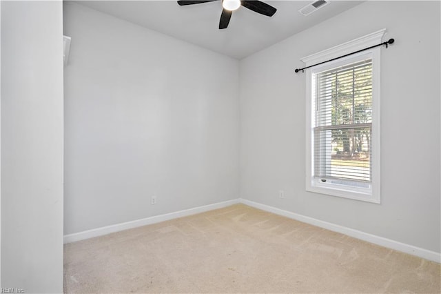 carpeted empty room with ceiling fan