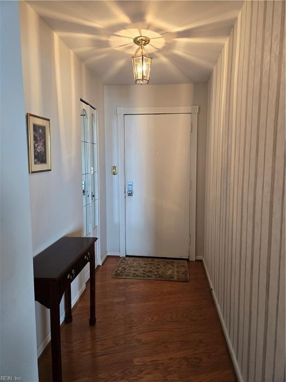 doorway featuring dark hardwood / wood-style flooring