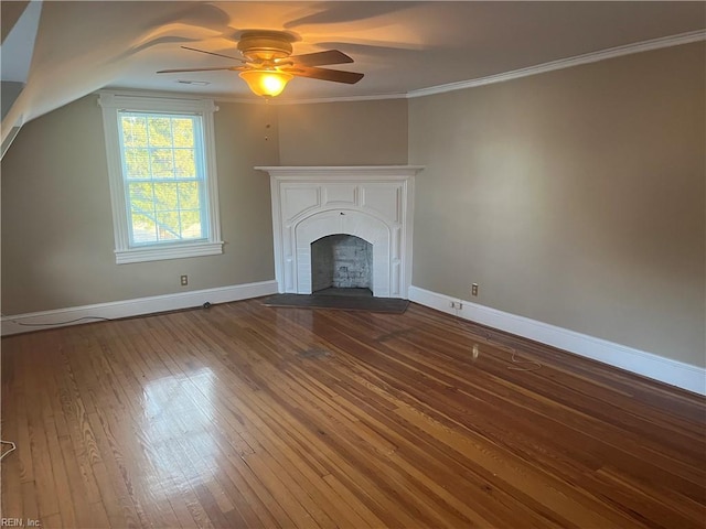 unfurnished living room featuring hardwood / wood-style flooring, ornamental molding, and ceiling fan