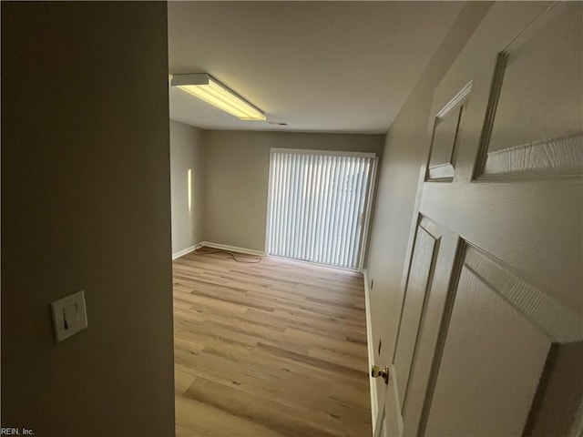 hall featuring light hardwood / wood-style floors