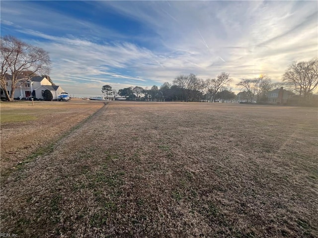 view of yard at dusk