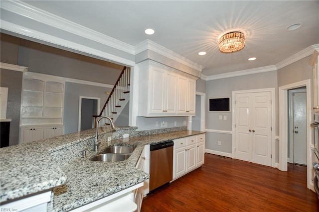 kitchen with sink, dark wood-type flooring, white cabinetry, light stone counters, and stainless steel dishwasher