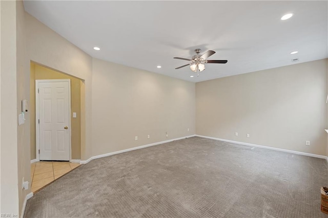 spare room with light carpet, baseboards, a ceiling fan, and recessed lighting