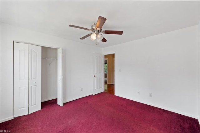 unfurnished bedroom featuring carpet floors, a closet, a ceiling fan, and baseboards