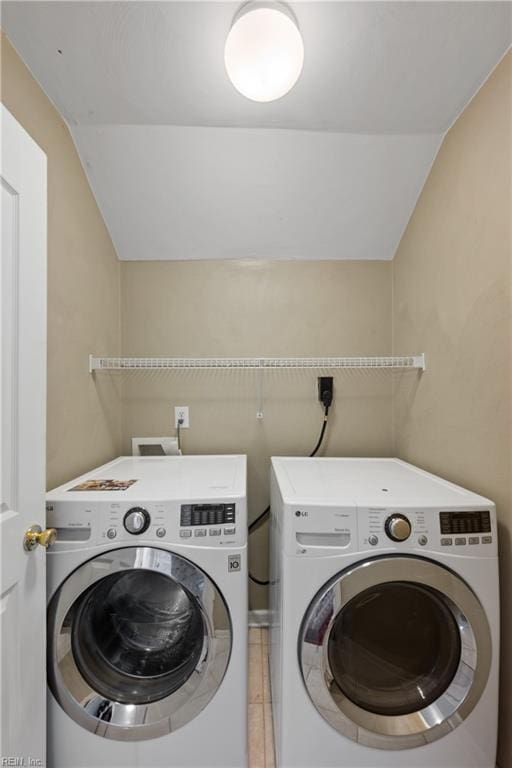 clothes washing area with laundry area and separate washer and dryer