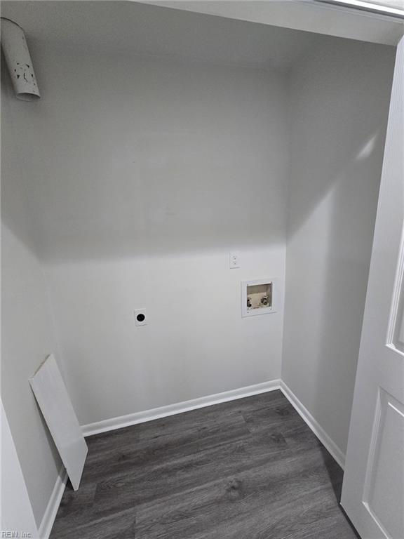 laundry area with hookup for a washing machine, dark hardwood / wood-style floors, and hookup for an electric dryer