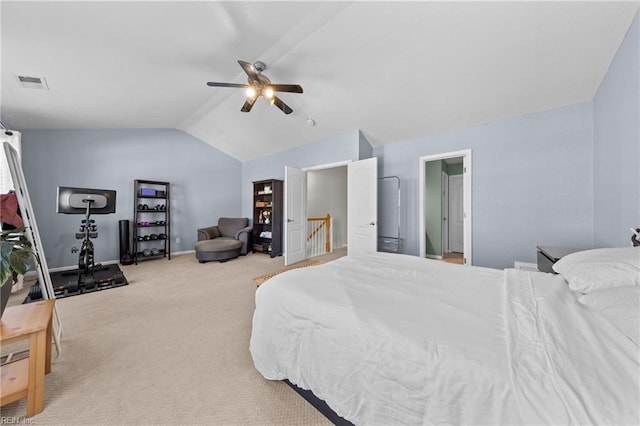 carpeted bedroom featuring lofted ceiling and ceiling fan