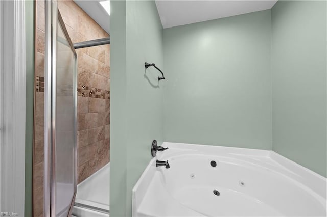 bathroom with shower with separate bathtub