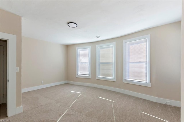 view of carpeted spare room