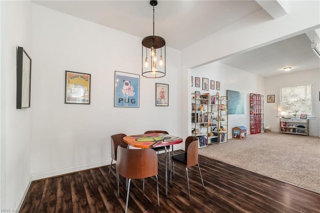 dining space featuring wood-type flooring