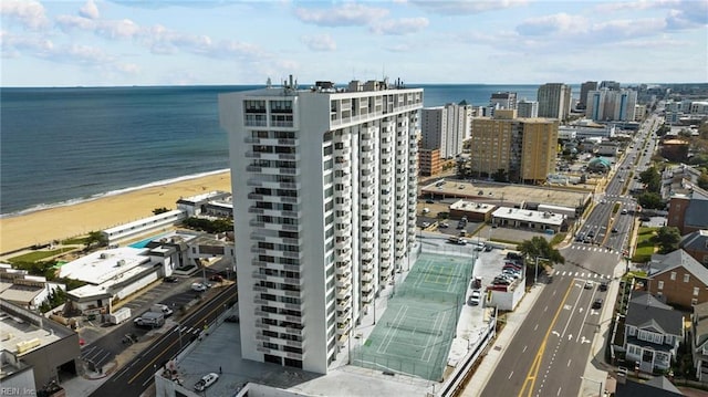 aerial view featuring a water view and a beach view