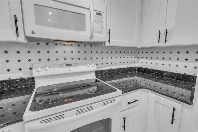 kitchen featuring tasteful backsplash, white appliances, and white cabinets