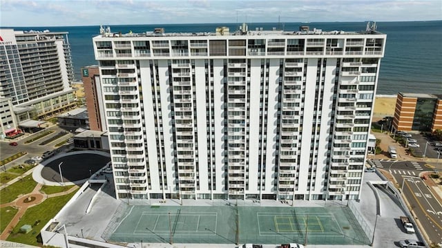 view of building exterior featuring a water view