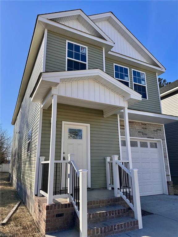 view of front of house with a garage